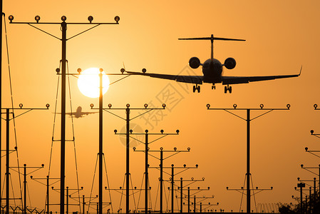 洛杉矶国际机场洛杉矶机场交通旅游着陆阳光飞机太阳目的地方式天空飞行背景