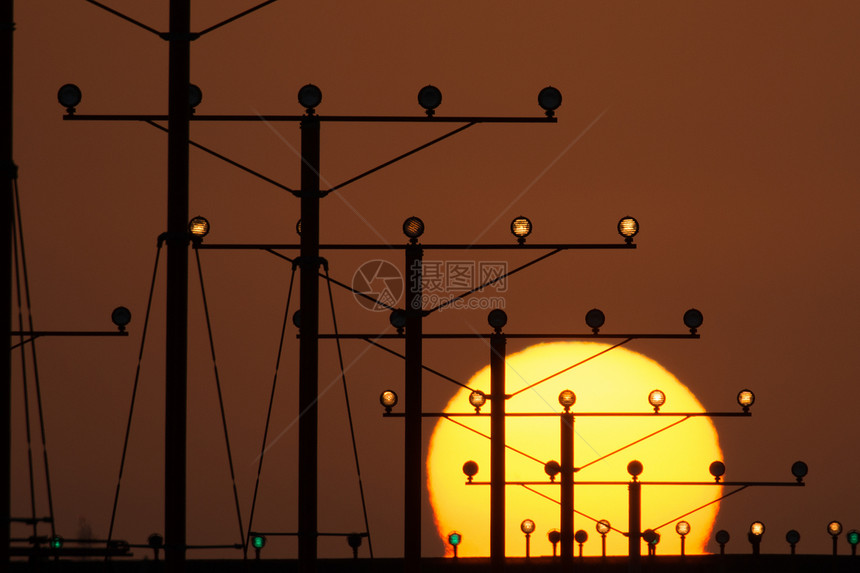 洛杉矶机场飞机场阳光太阳橙子运输天空着陆跑道目的地指导图片