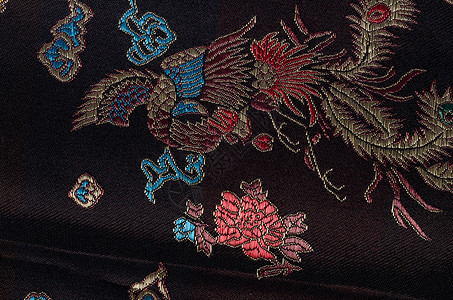 黑色和服绣花画幅刺绣手工工艺织物水平丝绸纺织品背景图片