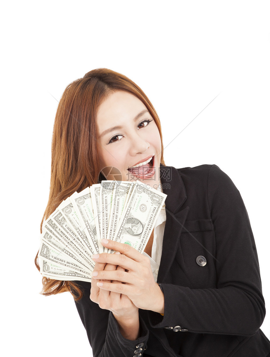 年轻笑着的女商务人士拿着钱图片