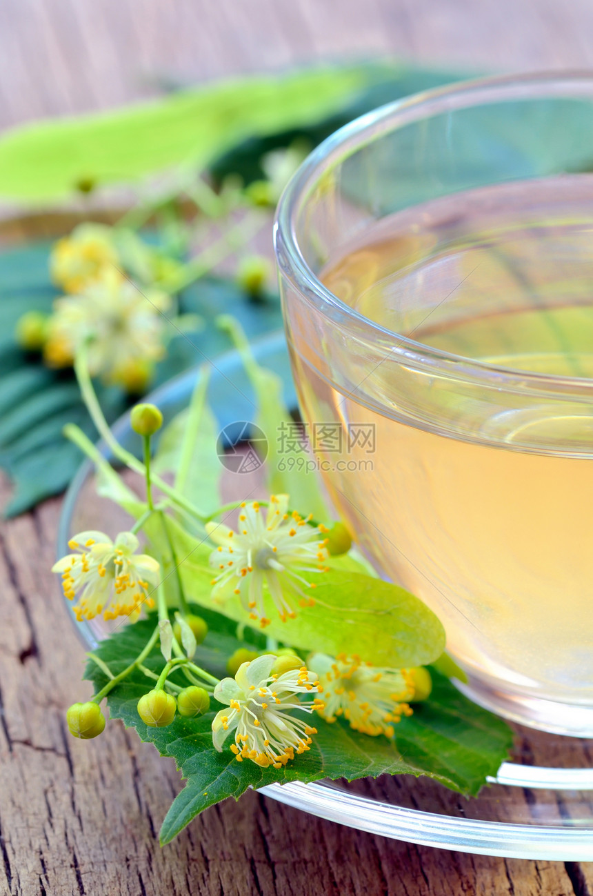 茶杯和林顿花叶子食物杯子宏观排毒文化液体玻璃药品植物图片