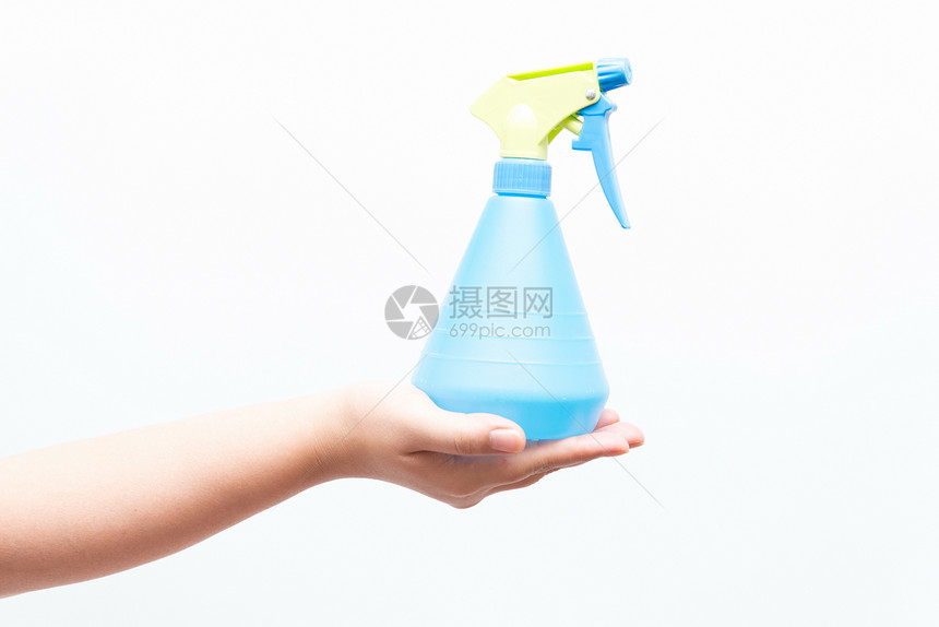 使用喷水器熨烫的亚洲妇女积分女士手指蓝色喷雾器白色手势工作室女孩图片