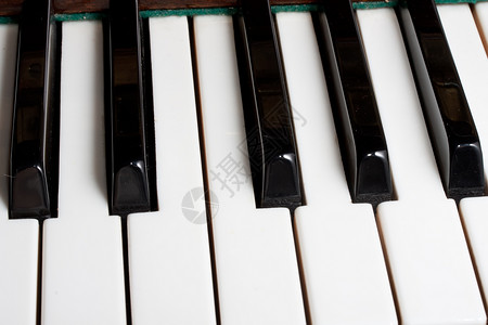 钢琴象牙白色笔记乐器乌木声学钥匙键盘音乐艺术背景图片