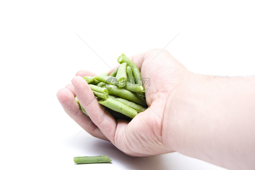 手中新鲜的绿棍豆食物手臂饮食绿色食品手指蔬菜图片