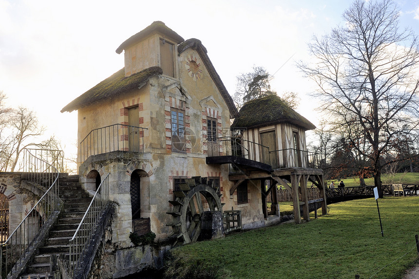 在凡尔赛城堡的公园文化女王乡村日落村庄历史随从房子花园遗产图片