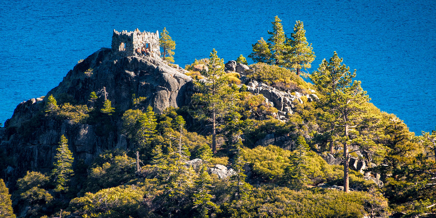 岛上的树木场景摄影旅游岩石水平全景目的地风景图片