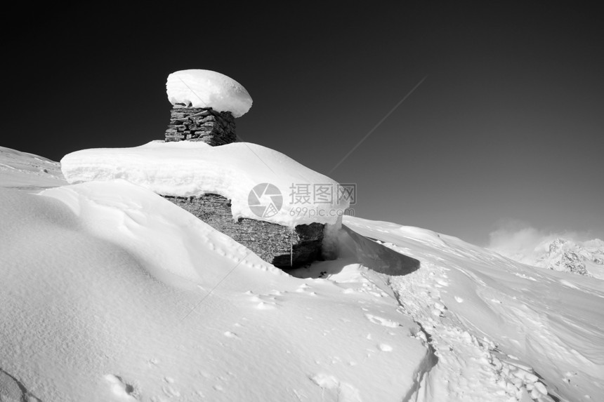 摇篮和雪雪自由风景雪鞋寂寞地形活动极端滑雪粉雪冒险图片