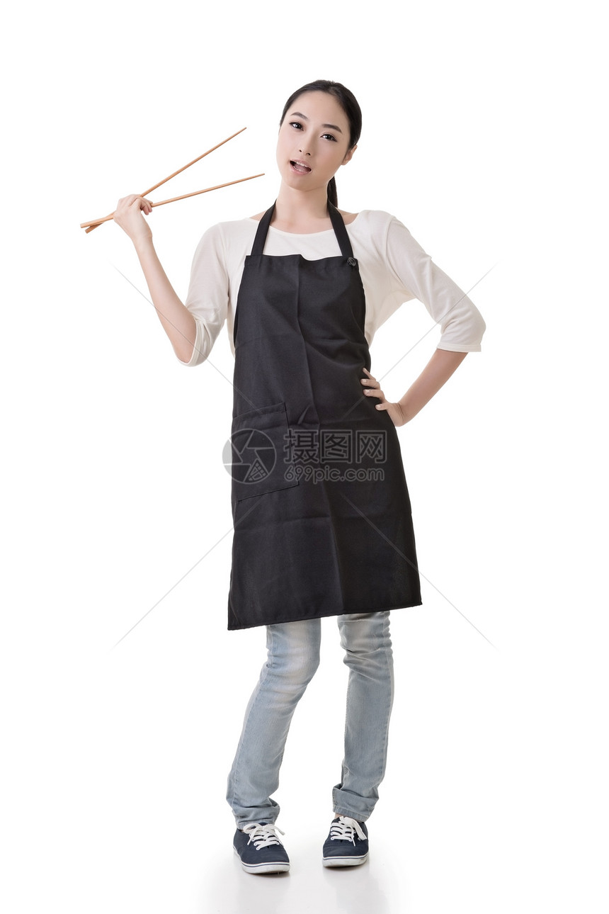亚洲家庭主妇女士厨房女孩厨师车工女性姿势筷子烹饪闲暇图片