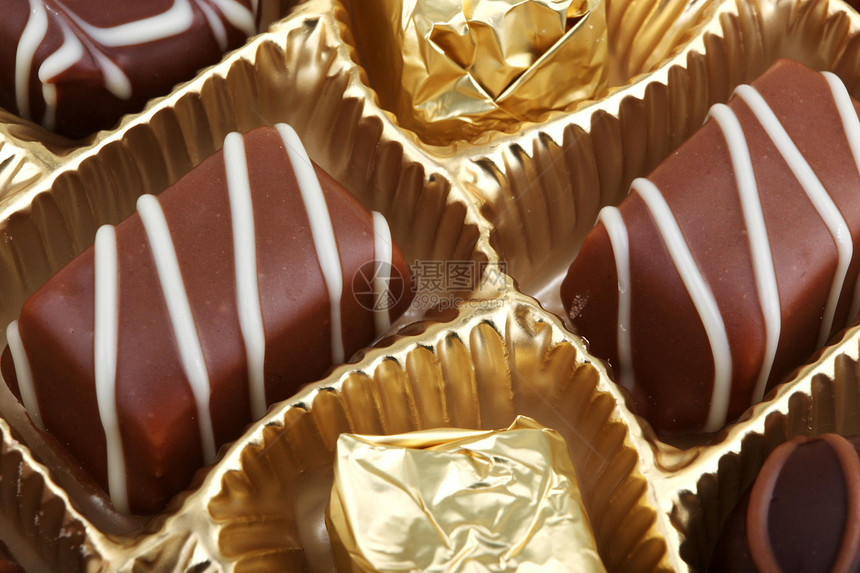 美味巧克力脆饼美食可可食物糖果收藏甜点白色黑色棕色牛奶图片