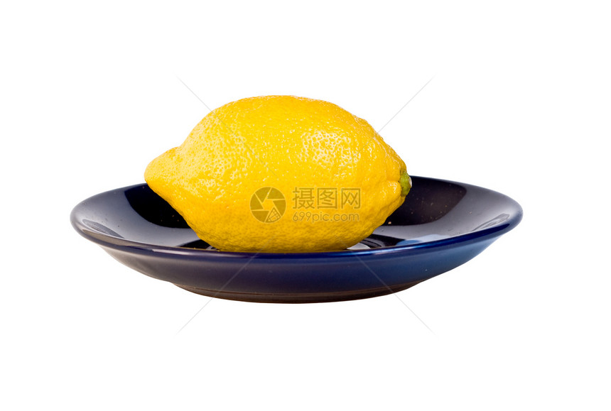 柠檬在盘子上营养黄色生物厨房食物饮食黑色白色食欲阴影图片
