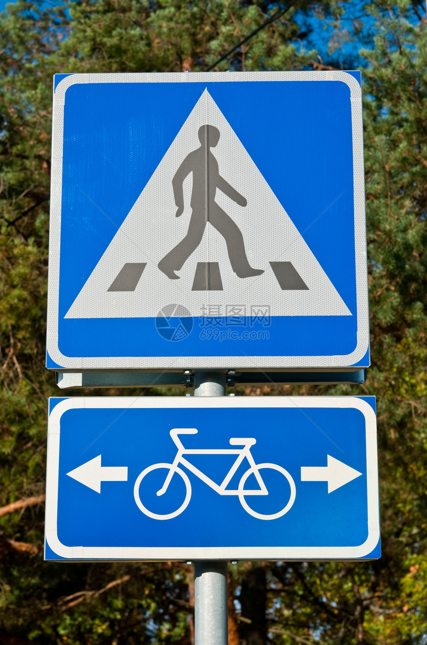路标路牌车道注意力小路白色公寓自行车行人蓝色民众警告图片
