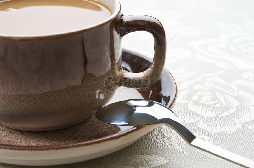 咖啡杯桌子桌布勺子白色服务盘子银器杯子飞碟图片