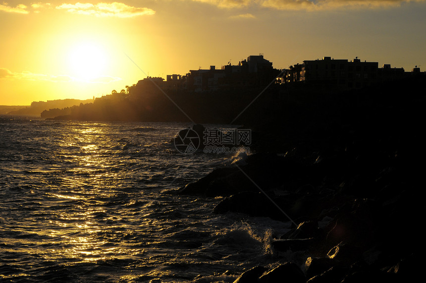 大西洋上空的日落城市支撑海滩海岸橙子风景天空海洋太阳海岸线图片