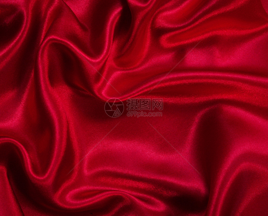 平滑优雅的红色丝绸作为背景织物柔软度布料窗帘纺织品曲线胭脂材料海浪奢华图片