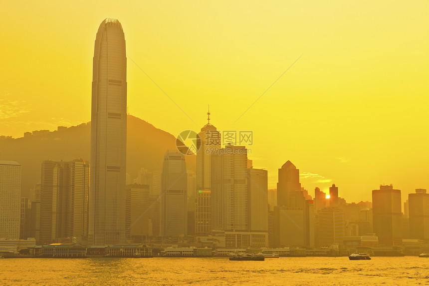 维多利亚港的香港日落码头金融天空夜景背景市中心景观旅游建筑旅行图片