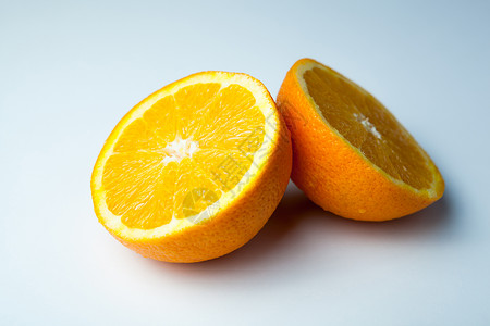 两片半橙子背景图片