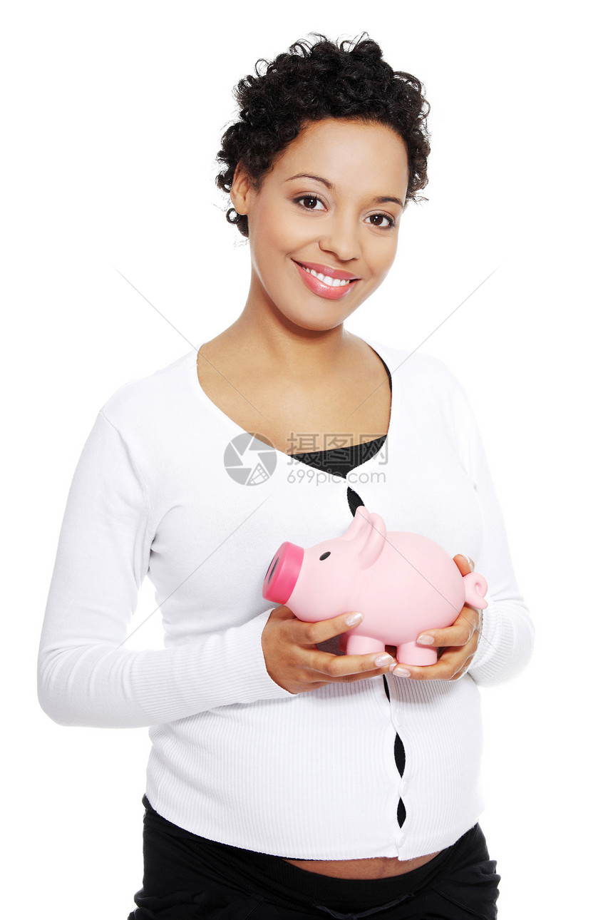 拥有小猪银行的孕妇工作室产妇怀孕金融肚子母性女孩生活母亲货币图片