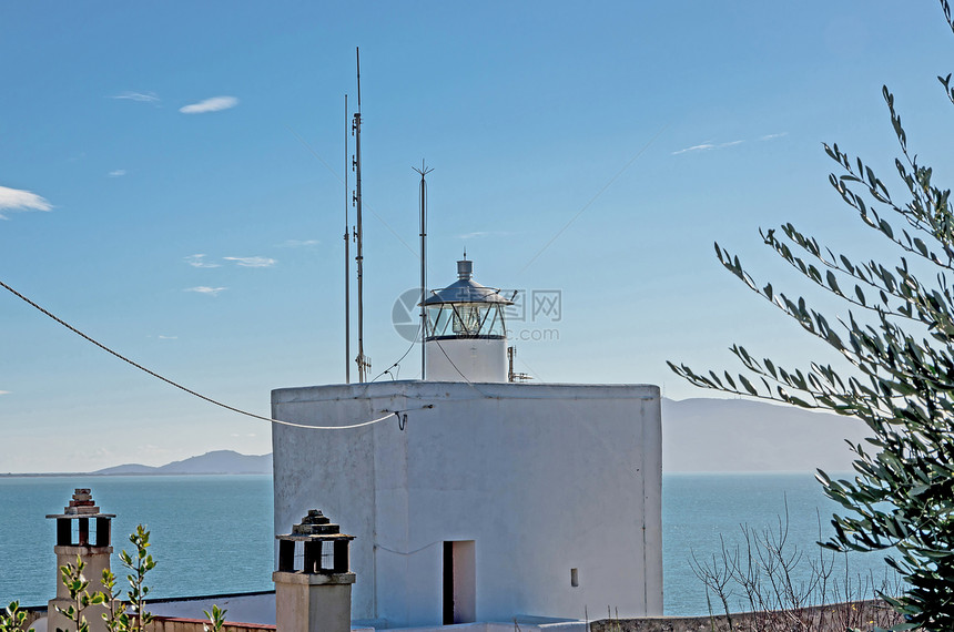 小型灯塔地标导航海岸线探照灯指导地平线海浪光束信号建筑学图片