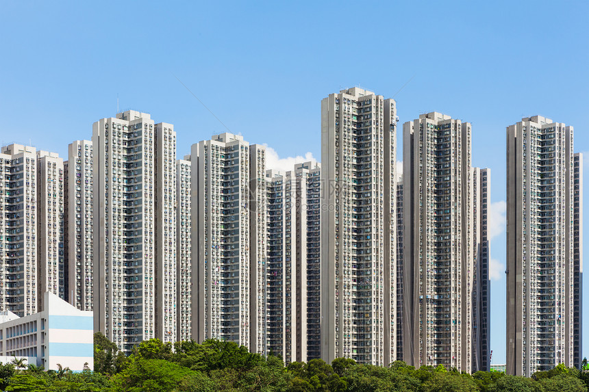 香港人口拥挤的大楼袖珍住宅天际都市晴天城市景观阳光风景场景图片