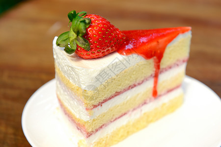 草莓蛋糕蛋糕奶油水果甜点红色白色食物盘子浆果背景图片