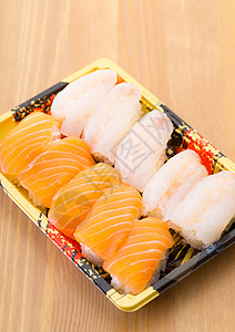 日本寿司美食盒子鱼片午餐便当背景图片