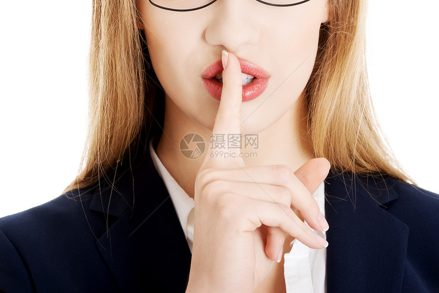 美丽的商业女人 用手指唇上的嘴唇女孩管理人员女性成人生意人人士秘书手势套装商务图片