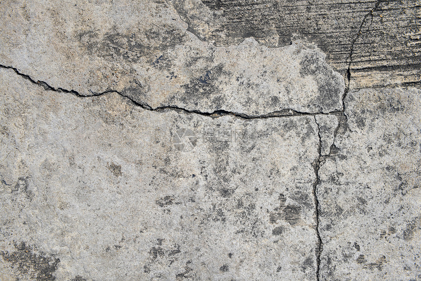 破碎的混凝土纹理封闭背景地面磨损石头粉碎材料灰色水泥印迹图片