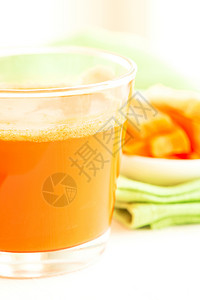 胡萝卜汁萝卜果汁餐巾玻璃背景图片