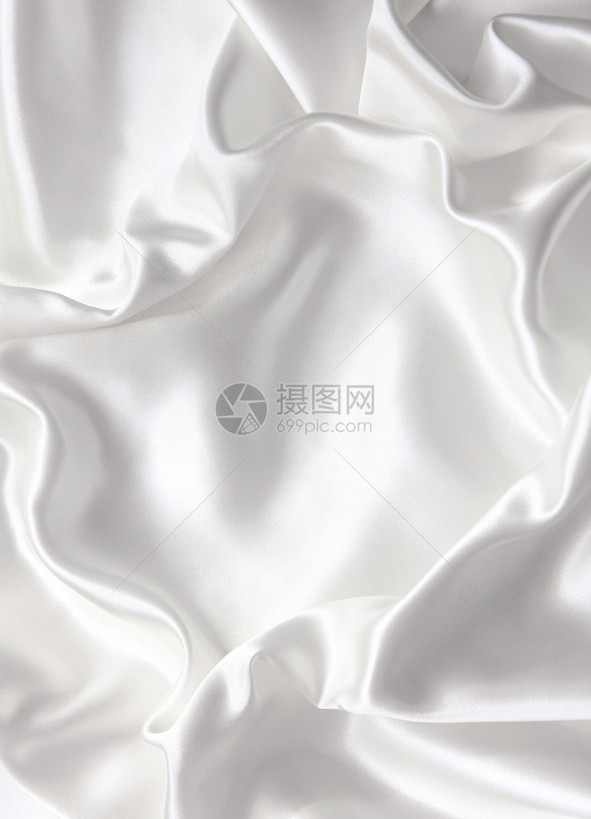作为婚礼背景的平滑优雅白色丝绸涟漪新娘银色曲线海浪纺织品投标布料折痕材料图片