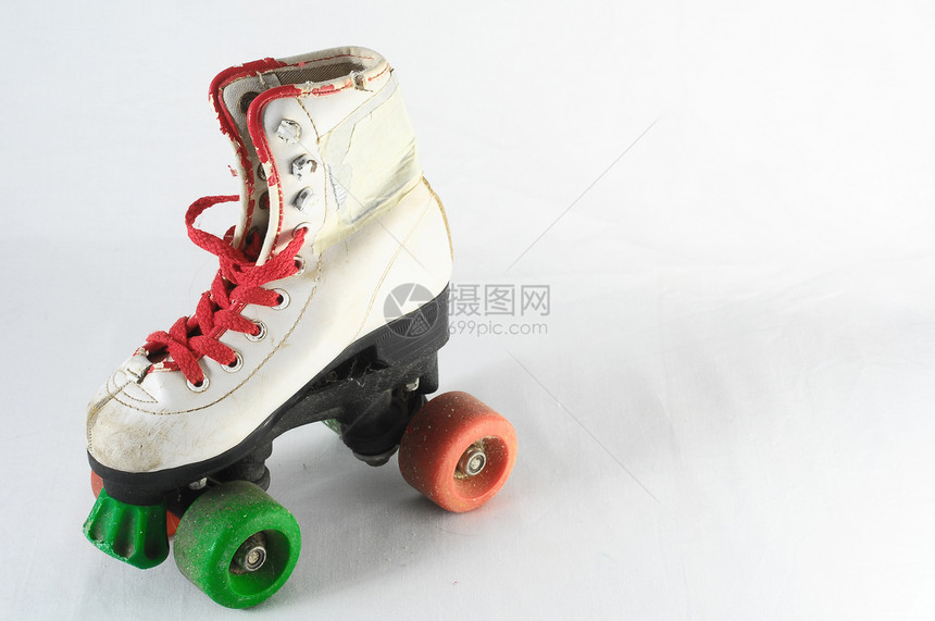 消耗的滚式滑板旱冰孩子们孩子消费鞋带溜冰者闲暇皮革滑冰娱乐图片