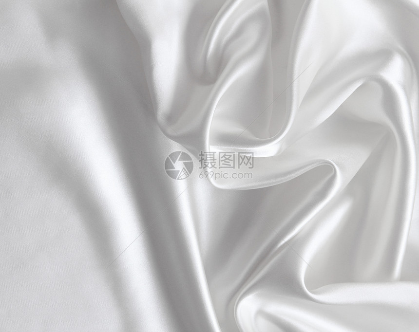 作为婚礼背景的平滑优雅白色丝绸海浪折痕投标材料布料织物曲线银色涟漪纺织品图片