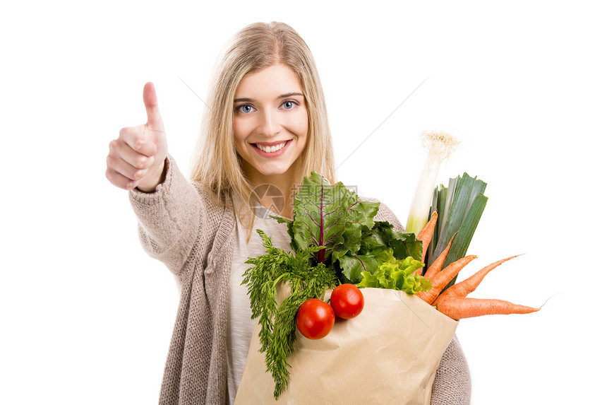 携带蔬菜的美丽女子顾客拇指营养购物饮食消费者市场微笑食物成人图片