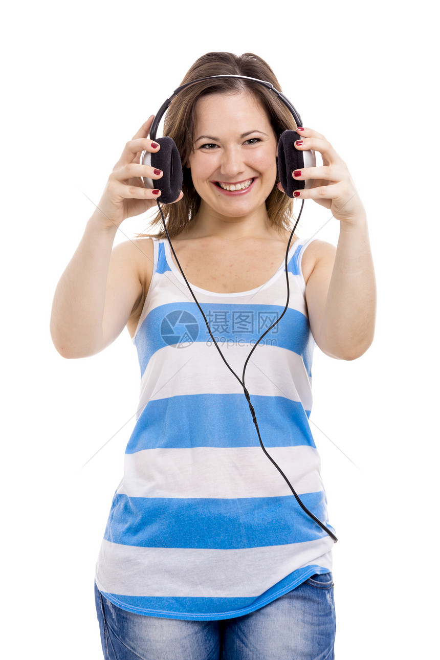 听音乐耳机微笑展示青年享受女性黑发女孩音乐手机图片