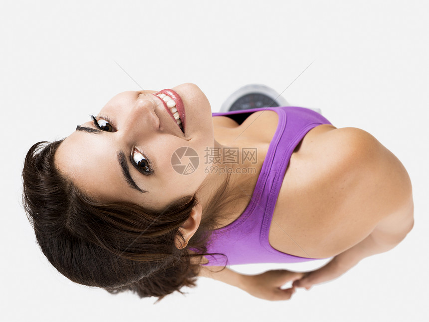 美丽和快乐的女运动员饮食平衡女孩保健重量拉丁腰部测量女性锻炼图片