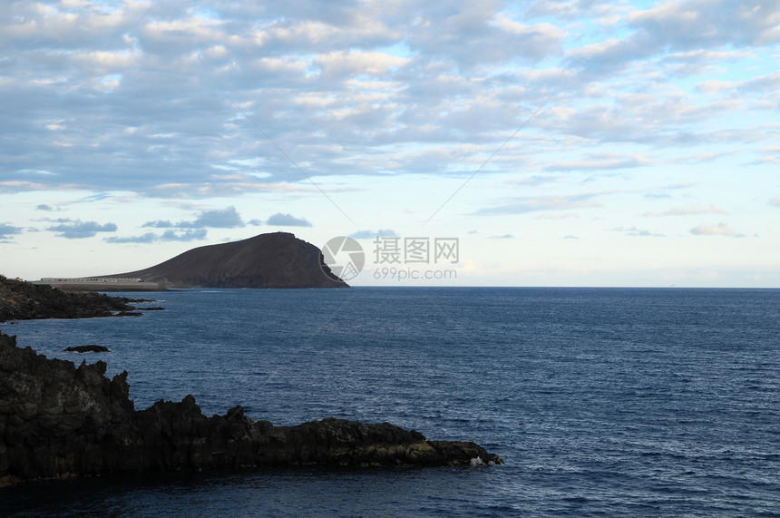 横跨大洋的彩云蓝色海滩日落阳光地平线太阳海洋图片