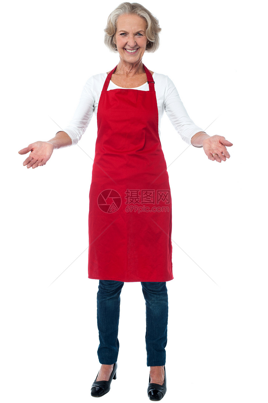 快乐的老厨师大驾欢迎商业餐饮老年人微笑女士围裙工作专家职业女性图片