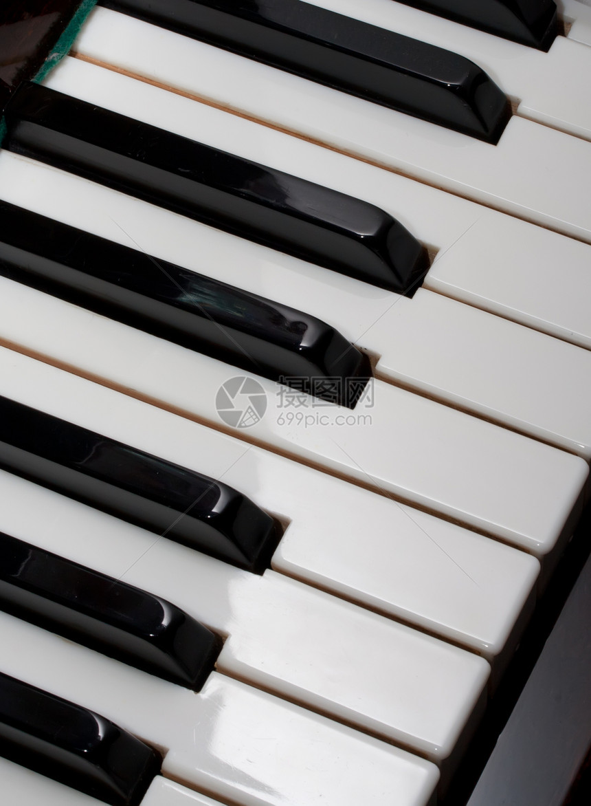 钢琴白色艺术音乐会旋律黑色声学键盘钥匙笔记乐器图片