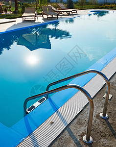 游泳池蓝色温泉水池背景图片