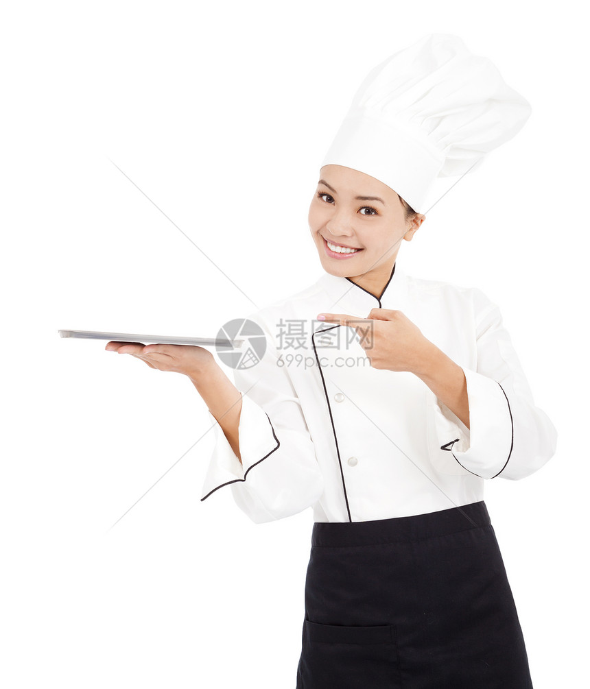 漂亮的厨师女厨师 拿着托盘看图片