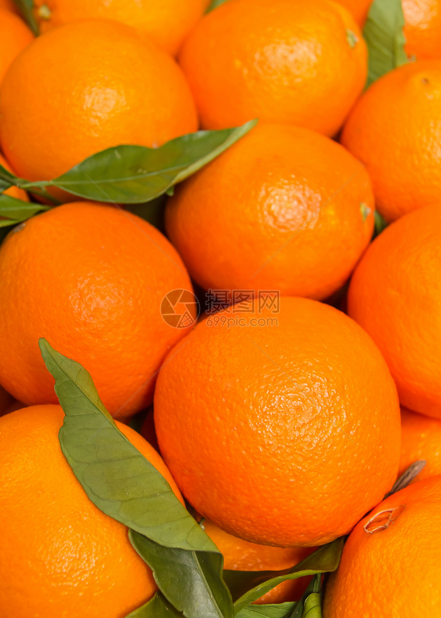 新鲜收集的酸性黄橘子水果叶子包装盒子农业茶点市场食物团体饮食图片