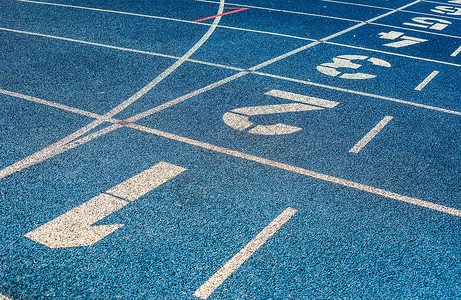 运行轨道竞赛蓝色起跑线体育场车道运动背景图片