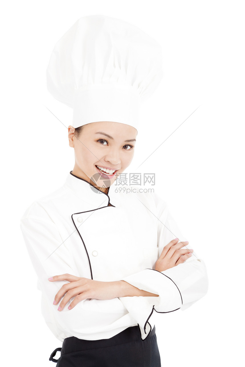 年轻女美容女厨师站在工作室图片