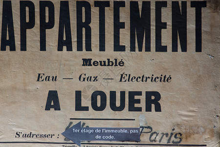 巴黎的旧房地产标志背景图片