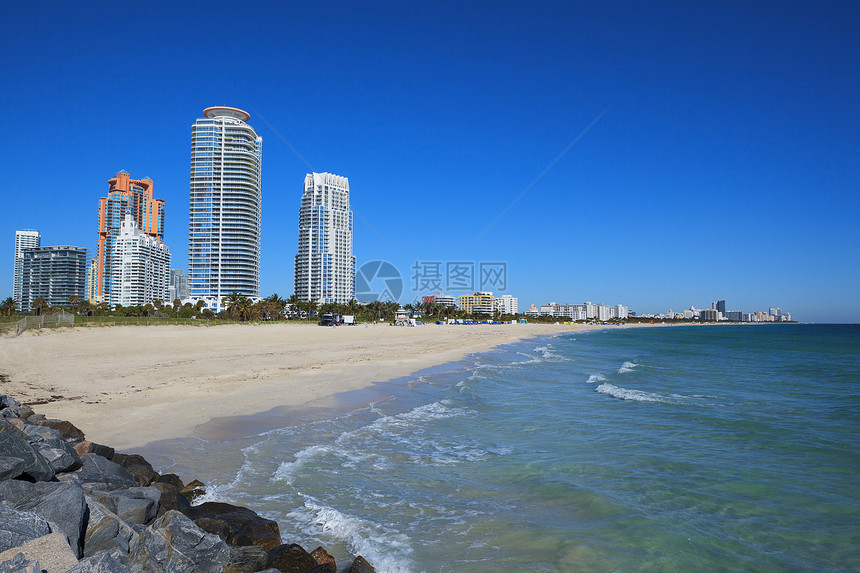 佛罗里达迈阿密海滩阳光游客假期棕榈微风风景建筑岩石海滩摩天大楼图片