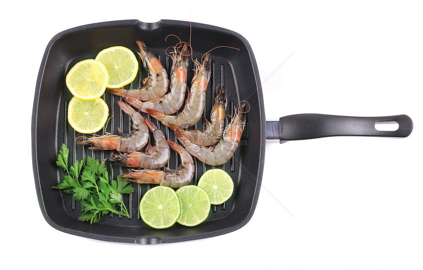 黑锅上的新虾养殖海鲜香菜营养贝类平底锅白色午餐油炸水产图片