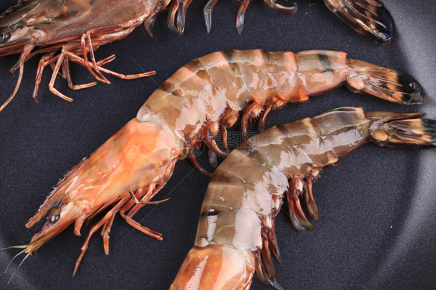 黑锅上的虎虾贝类白色午餐美食饮食平底锅海鲜甲壳黑色营养图片