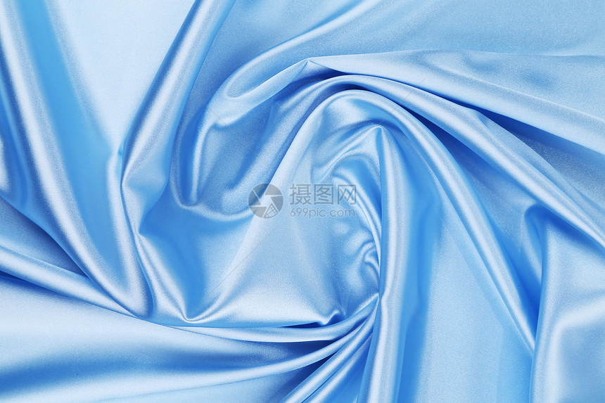 紧贴蓝丝织物背景布料奢华亚麻材料窗帘纺织品溪流帆布艺术海浪图片