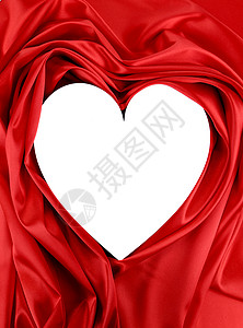 红色丝绸的白色心背景图片