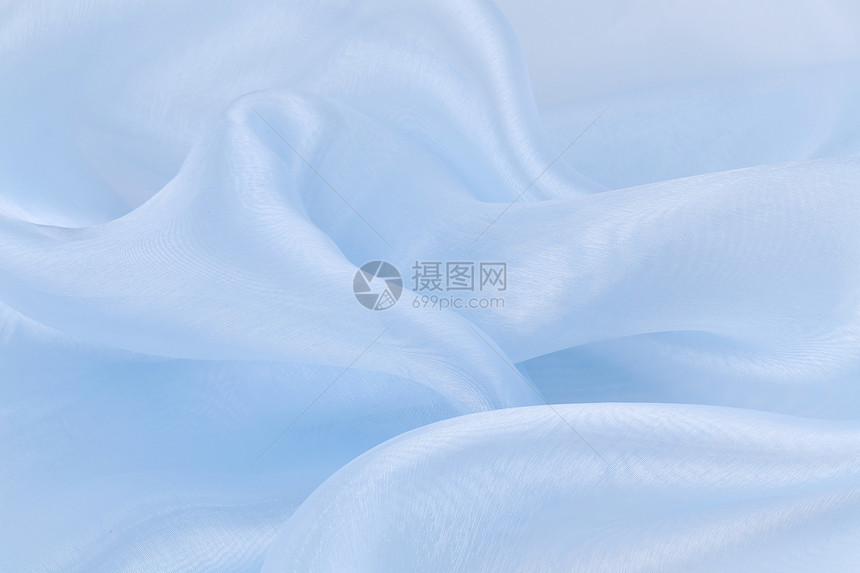 蓝色丝绸的背景材料床单织物衣服编织窗帘图片