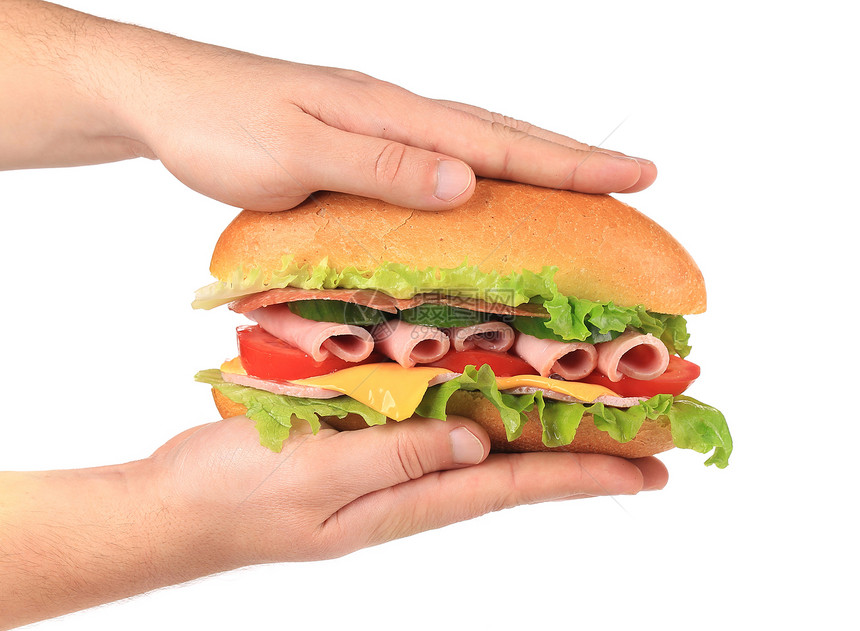 一半的法式面包三明治在手火腿猪肉美食蔬菜牛肉面包熟食洋葱胸部午餐图片